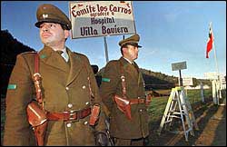 Chilean police at Colonia Dignidad gate, May 1997.